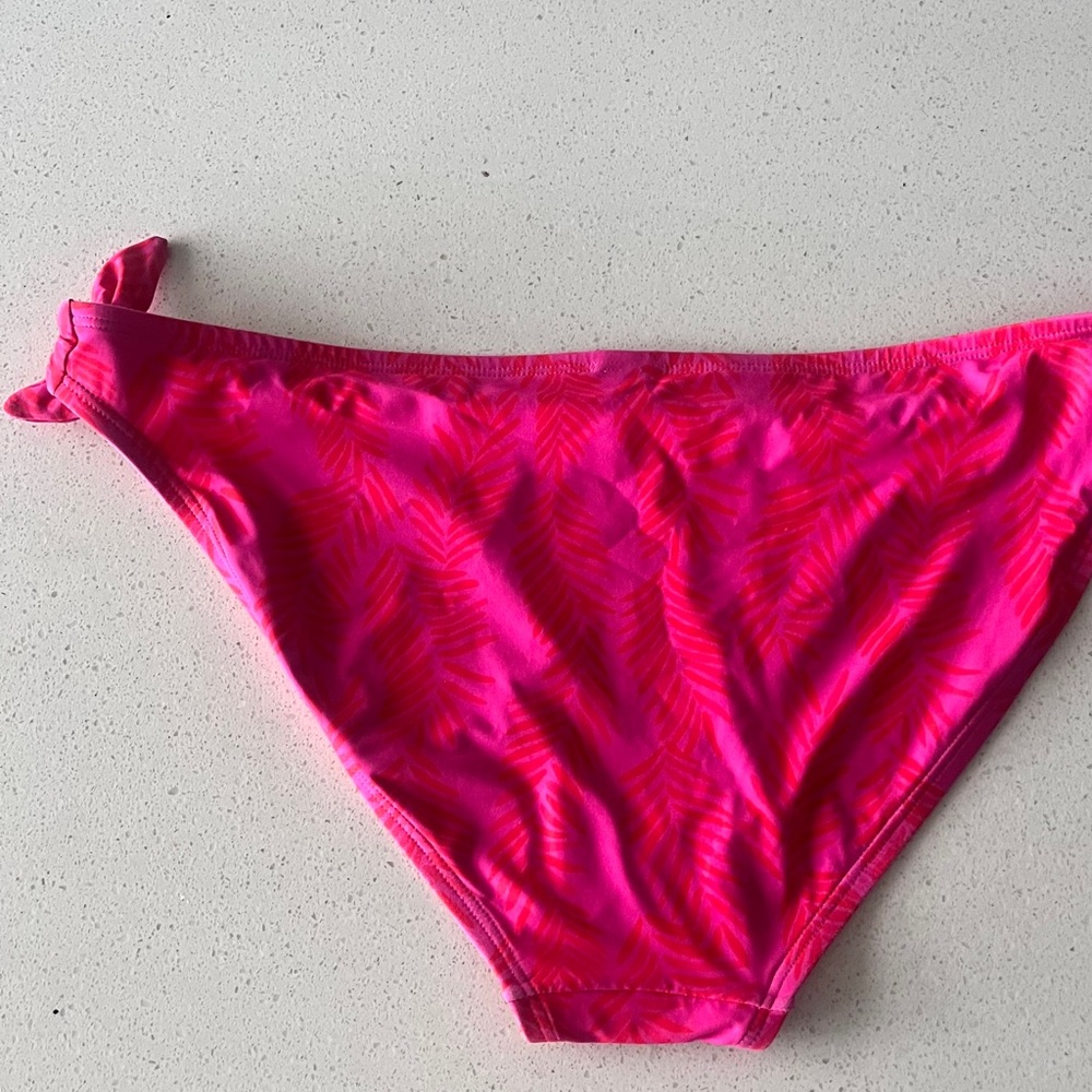 vibrant fish is pink side tie bikini brief swim bottoms